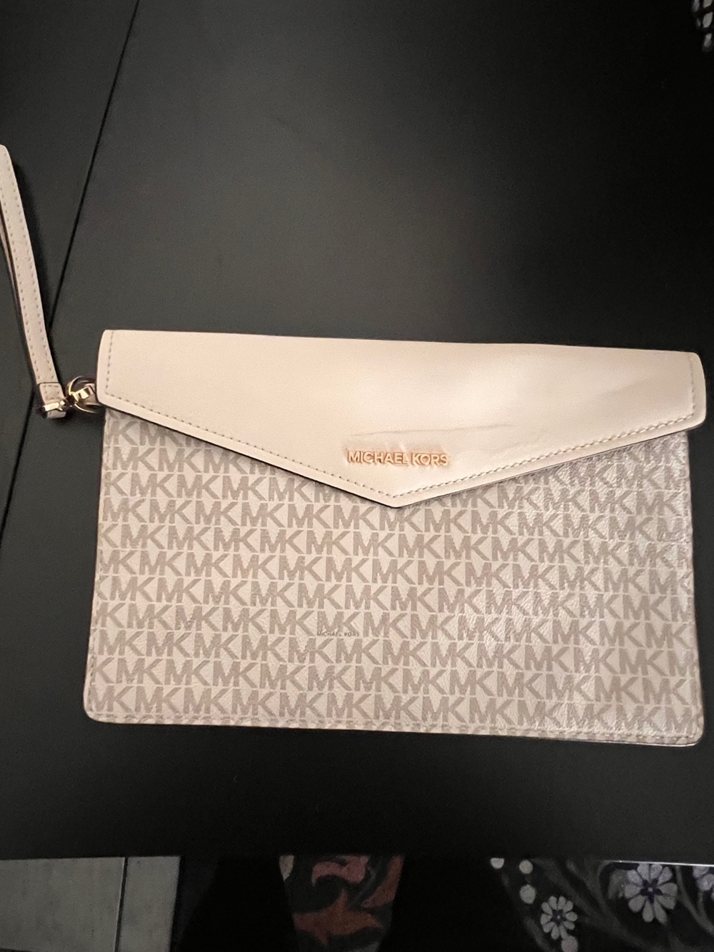 Michael Kore clutch